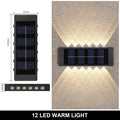 Lampe murale solaire étanche, lumière chaude haut et bas